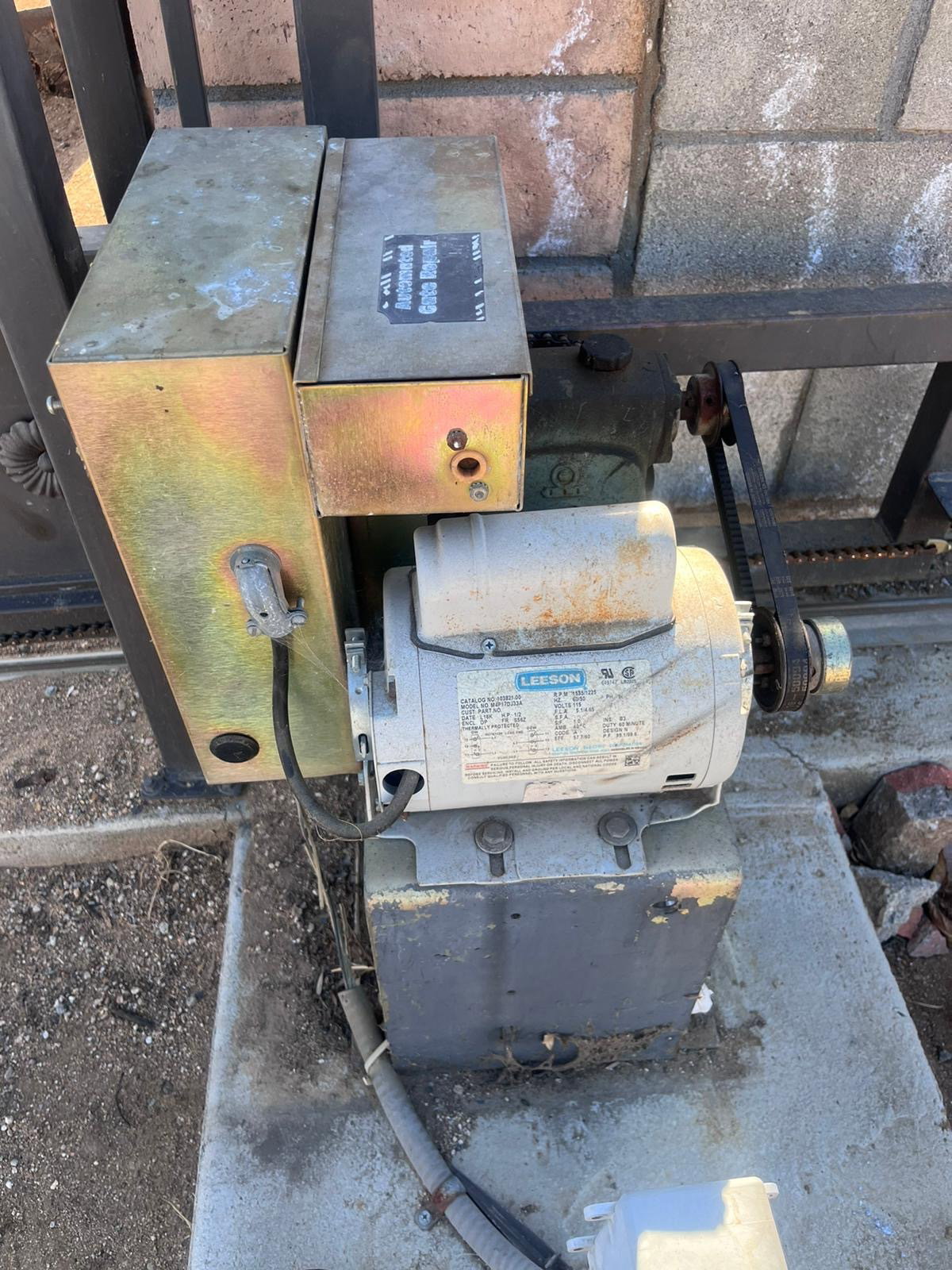 A commercial roll up door and gate serviced at a Rialto, California property