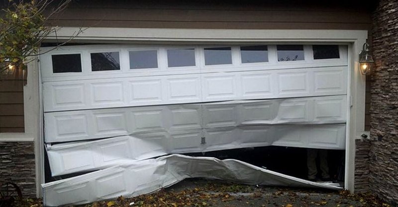 Damaged White Garage Door Panel Replacement, 24/7 Garage Door and Gate Services LLC, Inland Empire CA