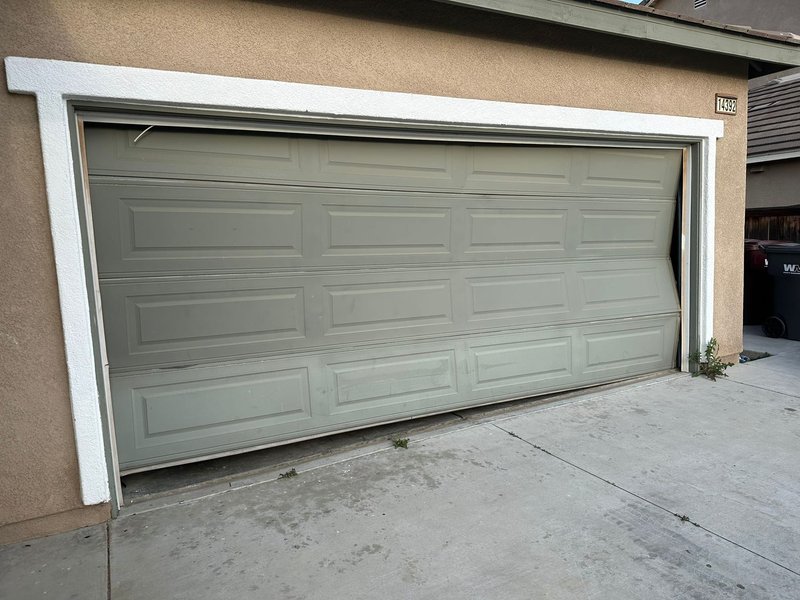 Dented and Misaligned Garage Door, 24/7 Garage Door and Gate Services LLC, Inland Empire CA