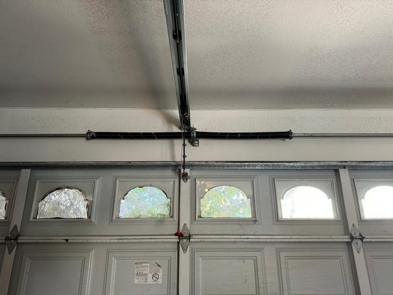 A garage door after spring replacement, balanced and back in service