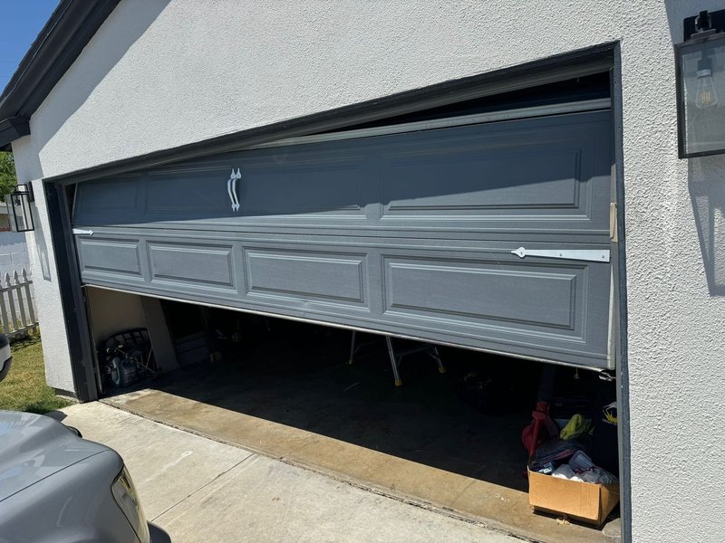 Gray Sectional Garage Door Off-Track Repair, 24/7 Garage Door and Gate Services LLC, Inland Empire CA