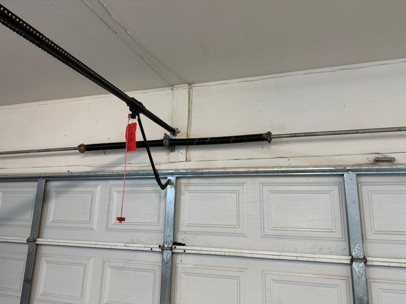 White Raised-Panel Door Torsion Spring Repair, 24/7 Garage Door and Gate Services LLC, Inland Empire CA