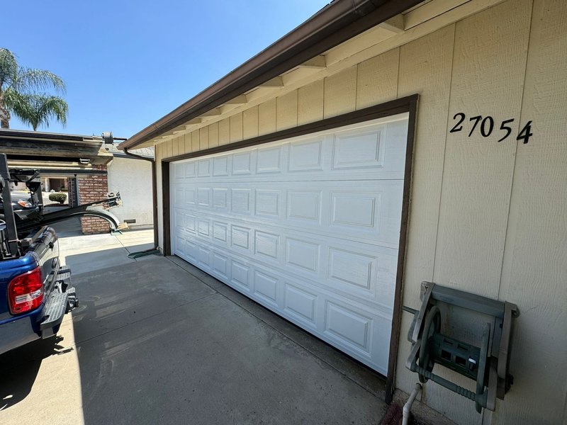 White Raised-Panel Sectional Garage Door Installation, 24/7 Garage Door and Gate Services LLC, Inland Empire CA