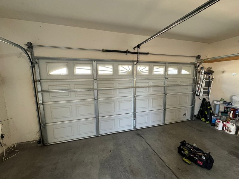 Off-track garage door repair completed in Riverside, California